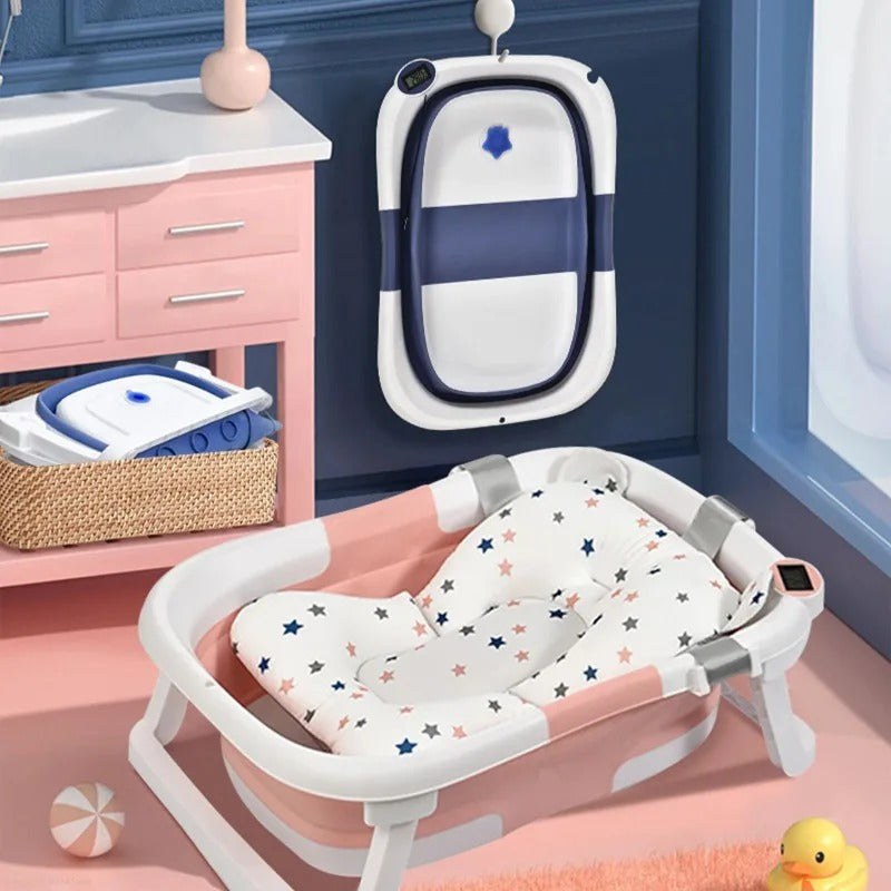 Baignoire pliable pour bébé avec coussin antidérapant et thermomètre intégré.