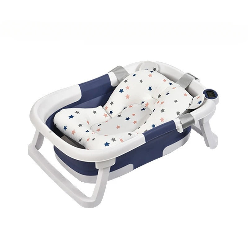 Baignoire pliable pour bébé avec coussin antidérapant et thermomètre intégré.